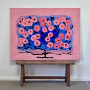 "Tree of Life: Pink Flowers Against a Blue Sky"